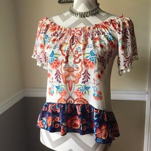 Vibrant off the shoulder floral cropped top